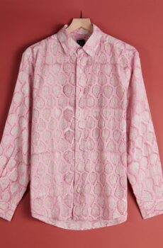 A pink and white patterned button shirt
