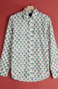 A white shirt with a green allover pattern